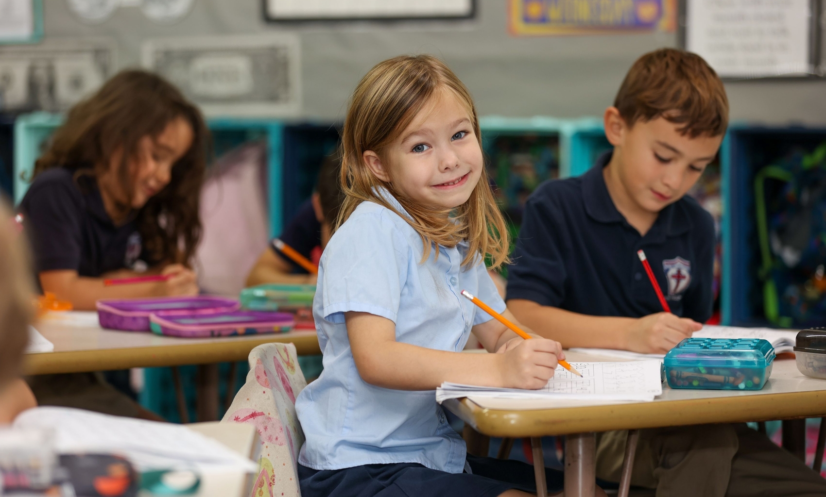 Girl doing classwork at school